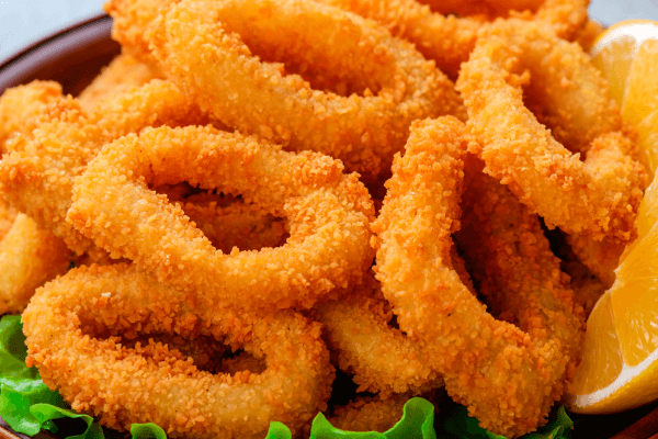 Хрусткі цибульні кільця в клярі — 7 шикарних рецептів!