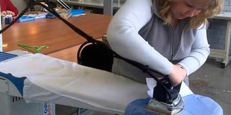 Як прасувати футболку на прасувальній дошці